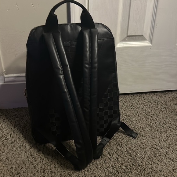BLACK LV backpack only used once it was and Christmas gift price is negotiable - Picture 2 of 5